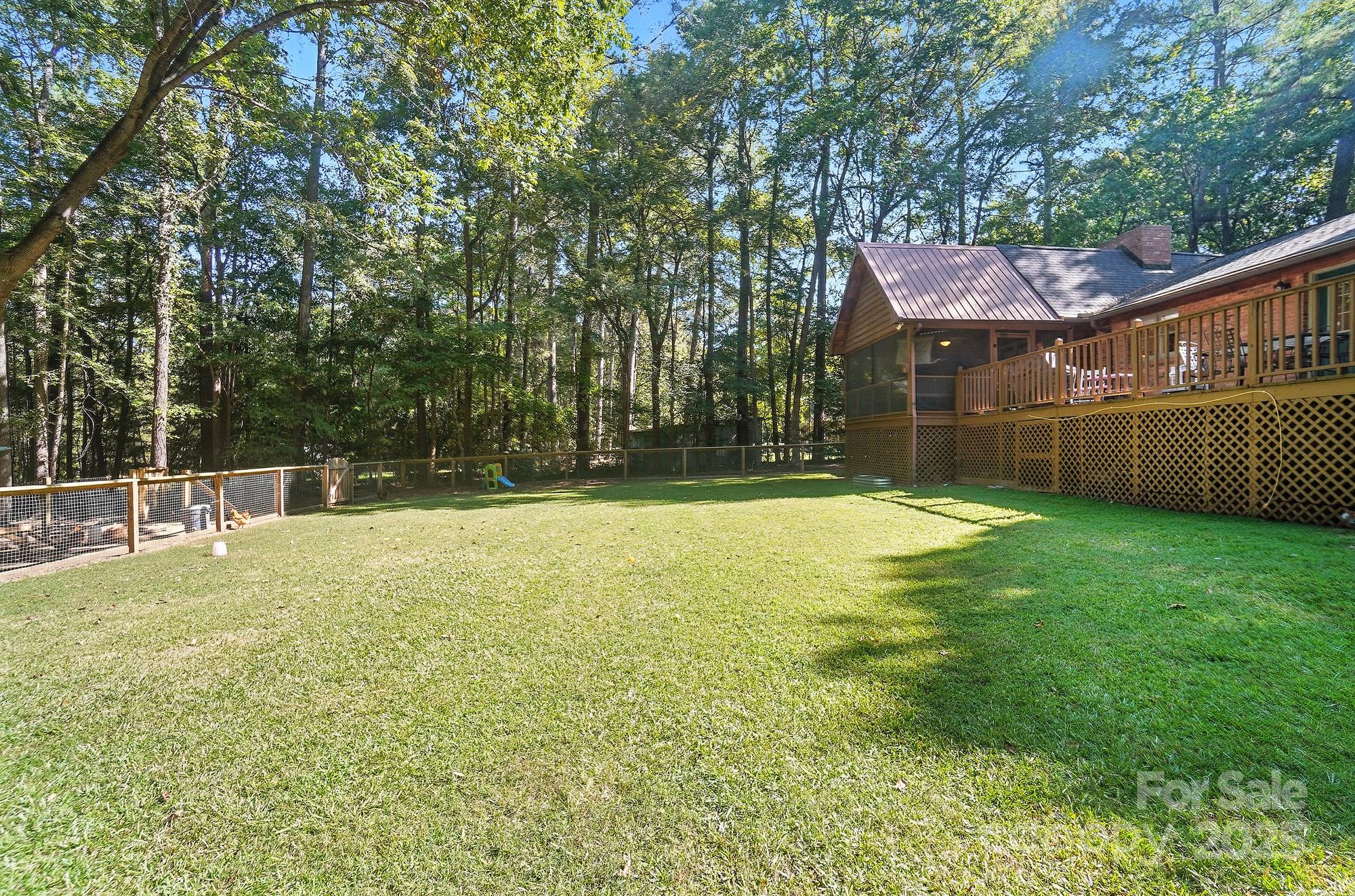 3618 Griffith Road Monroe, NC 28112 - Photo 42 of 48 a view of a house with a backyard