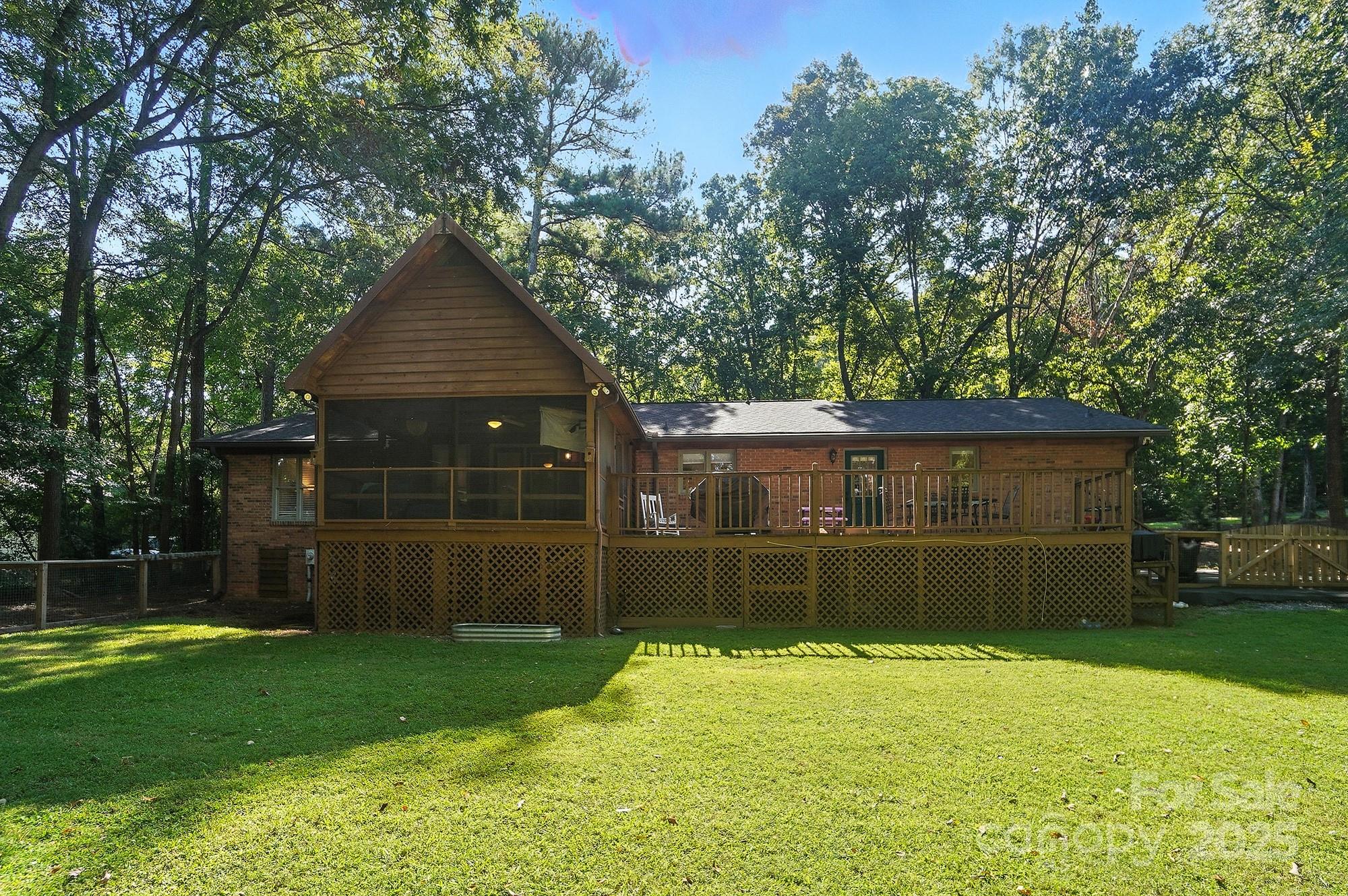 3618 Griffith Road Monroe, NC 28112 - Photo 43 of 48 a front view of a house with a yard