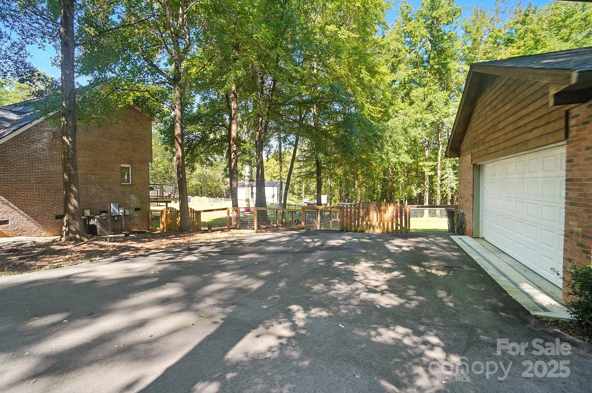 3618 Griffith Road Monroe, NC 28112 - Photo 48 of 48 a view of a house with a tree