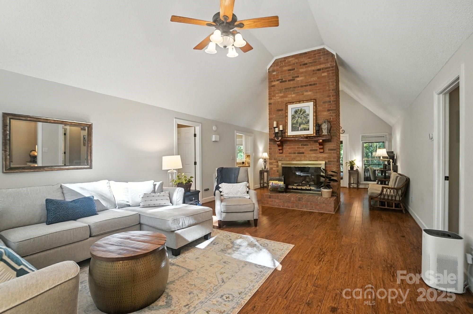 3618 Griffith Road Monroe, NC 28112 - Photo 7 of 48 a living room with furniture and a fireplace