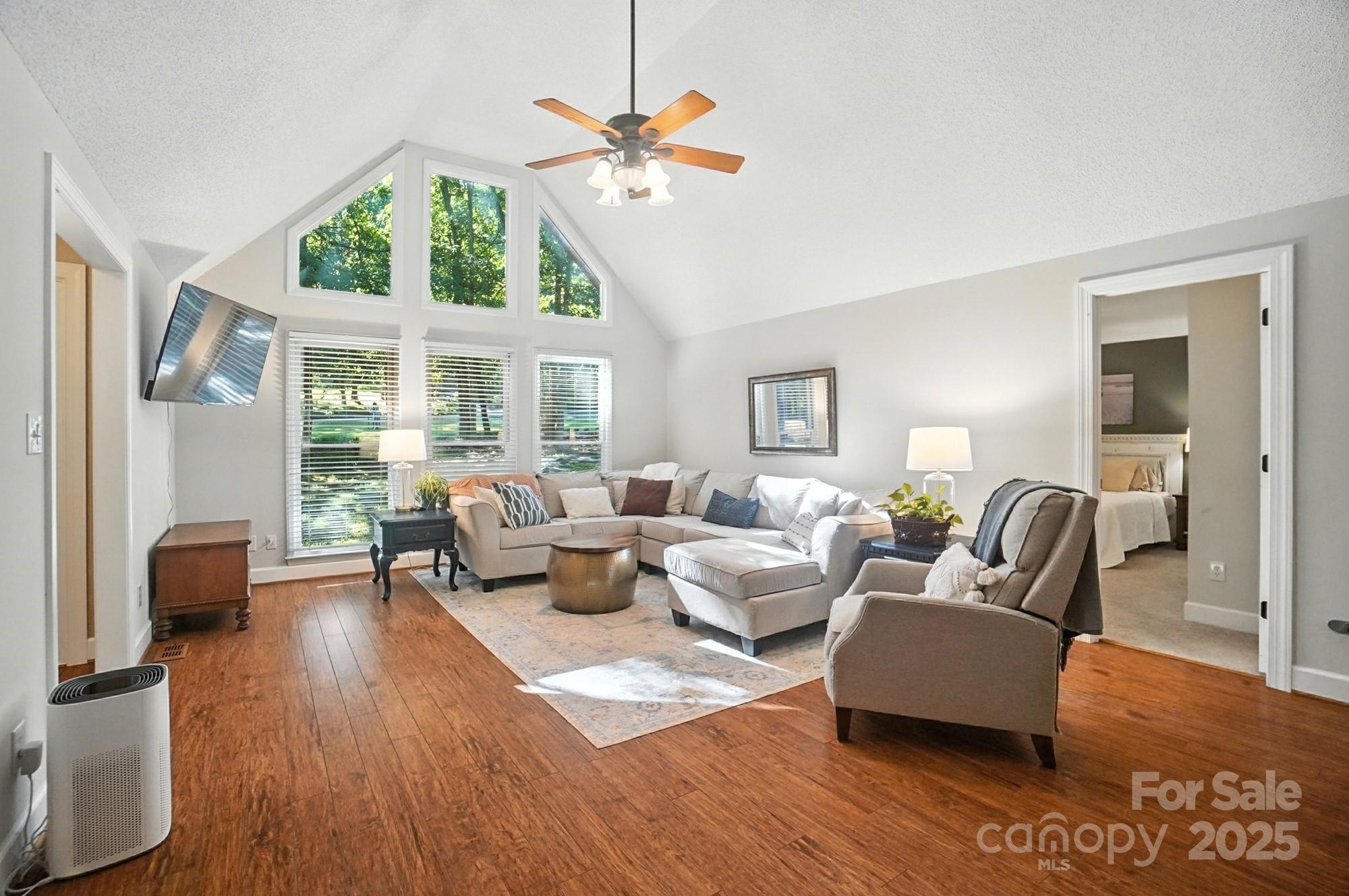 3618 Griffith Road Monroe, NC 28112 - Photo 8 of 48 a living room with furniture fireplace and a large window