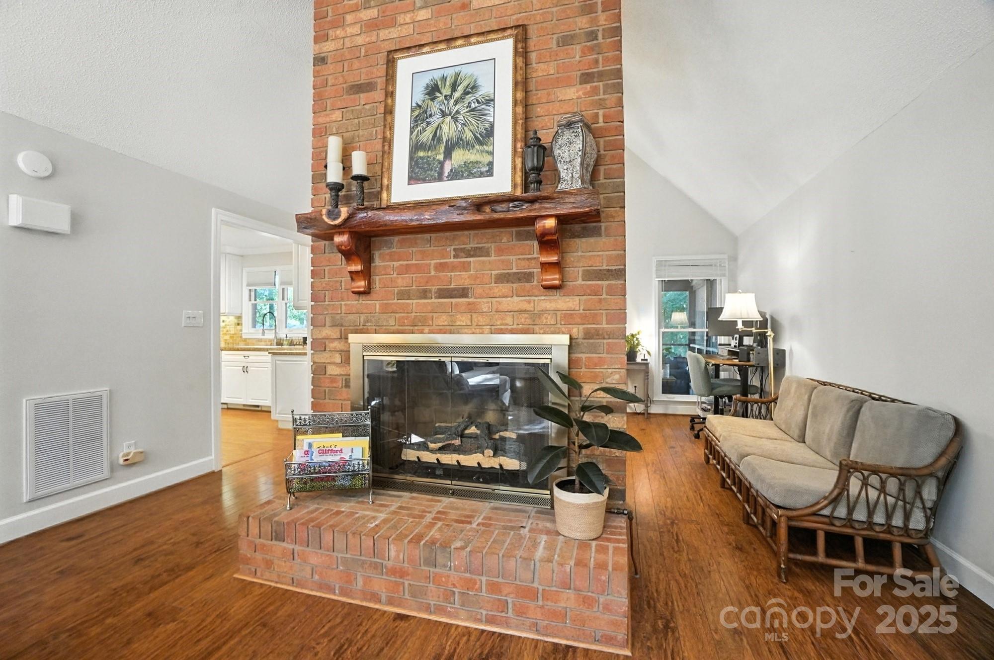 3618 Griffith Road Monroe, NC 28112 - Photo 10 of 48 a living room with furniture and a fireplace