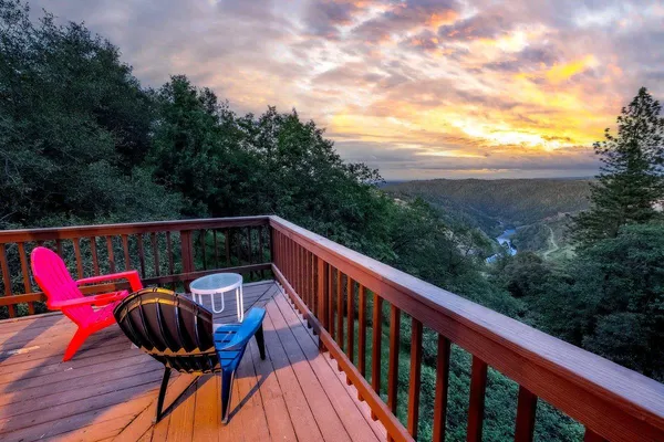 a view of balcony with furniture