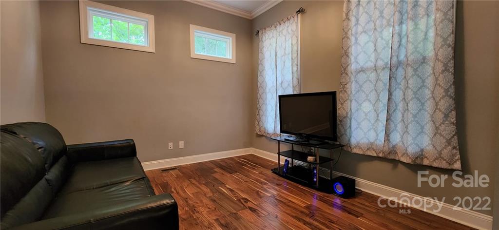 3068 Point Clear Drive Tega Cay, SC 29708 - Photo 15 of 31 a living room with furniture and a flat screen tv