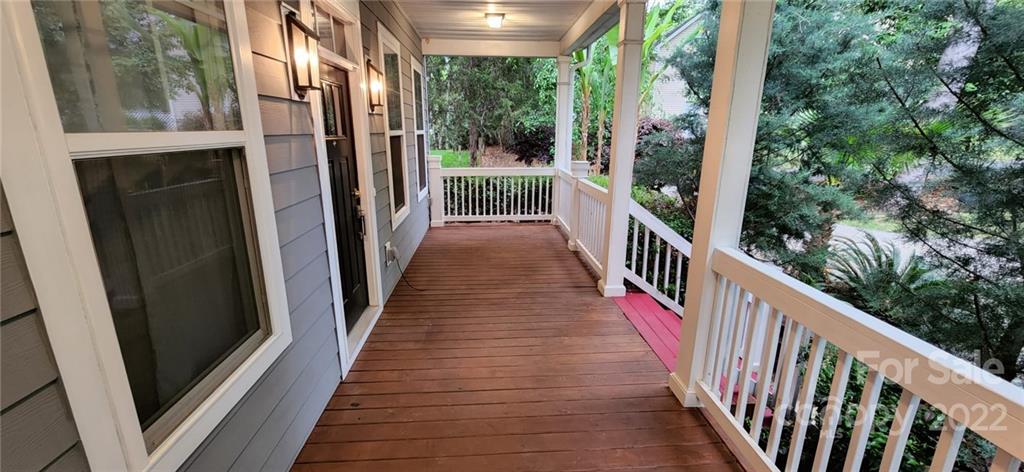 3068 Point Clear Drive Tega Cay, SC 29708 - Photo 3 of 31 a view of balcony with wooden floor