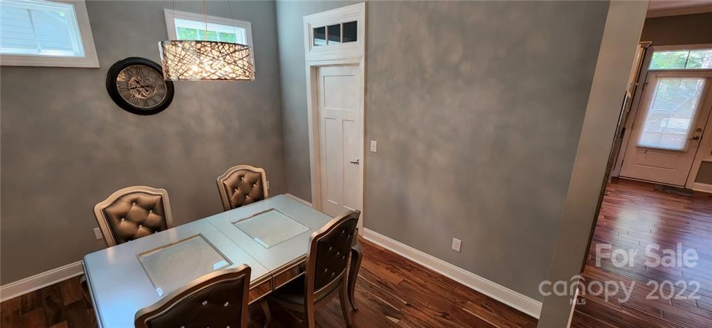 3068 Point Clear Drive Tega Cay, SC 29708 - Photo 4 of 31 a view of a room with a table and chairs