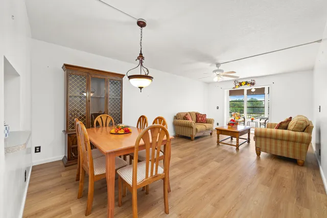 a view of a livingroom with furniture and window