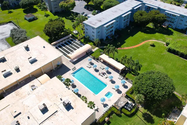 a view of backyard with a garden and plants