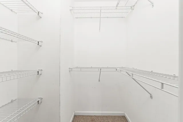 a view of a room with racks on the wall