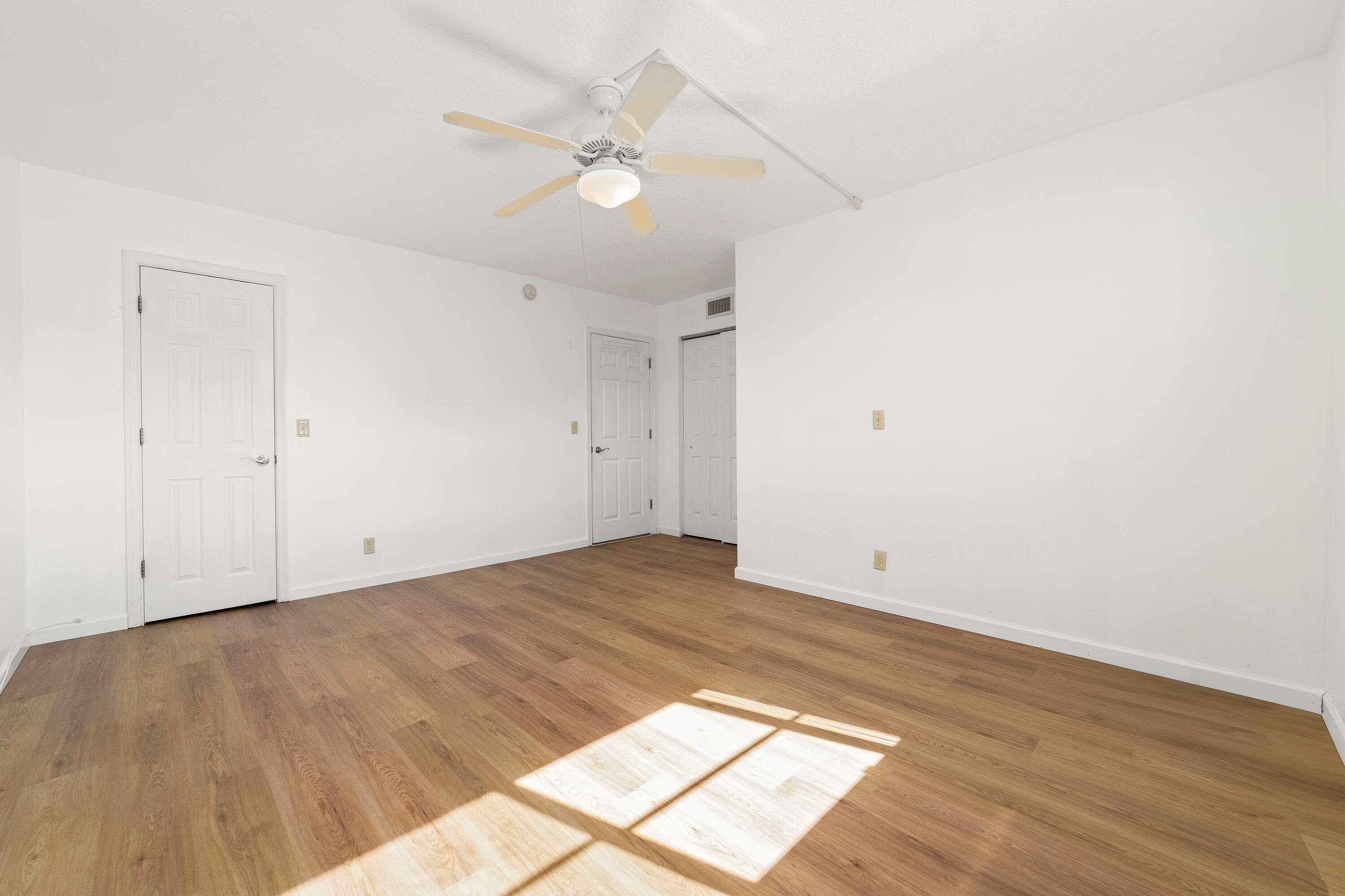 230 Northeast 26th Avenue, Unit 3020 Boynton Beach, FL 33435 - Photo 35 of 44 wooden floor in a room