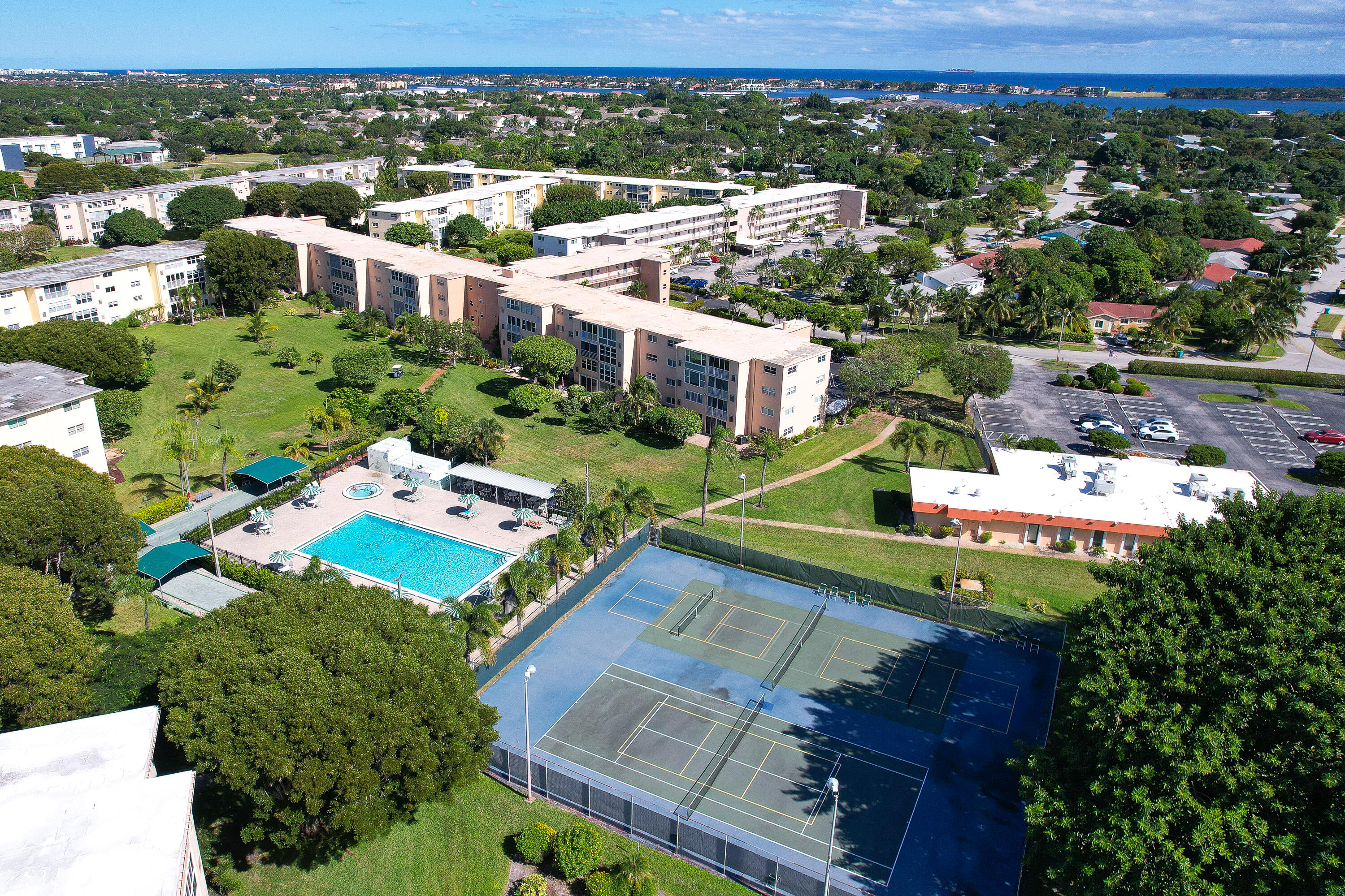230 Northeast 26th Avenue, Unit 3020 Boynton Beach, FL 33435 - Photo 41 of 44 an aerial view of a house with a yard