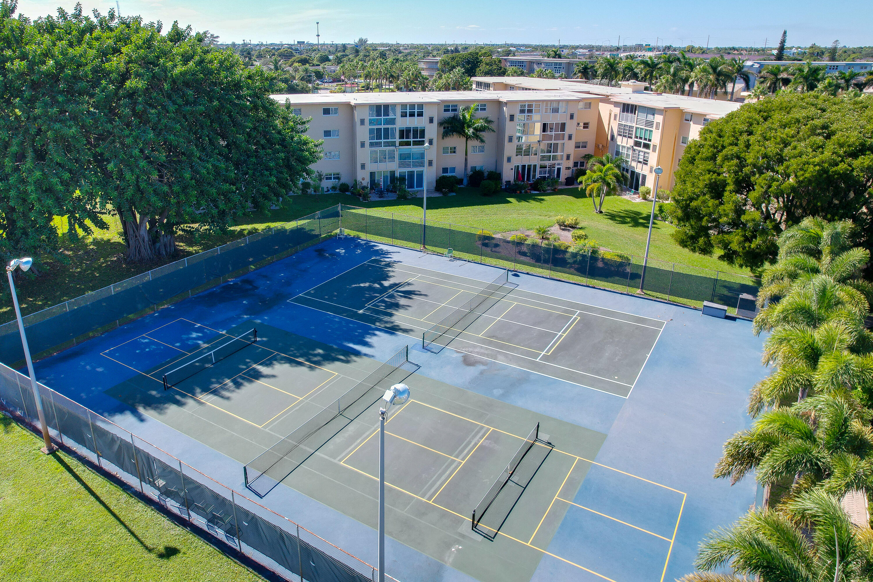 230 Northeast 26th Avenue, Unit 3020 Boynton Beach, FL 33435 - Photo 44 of 44 a view of a backyard with a garden and plants