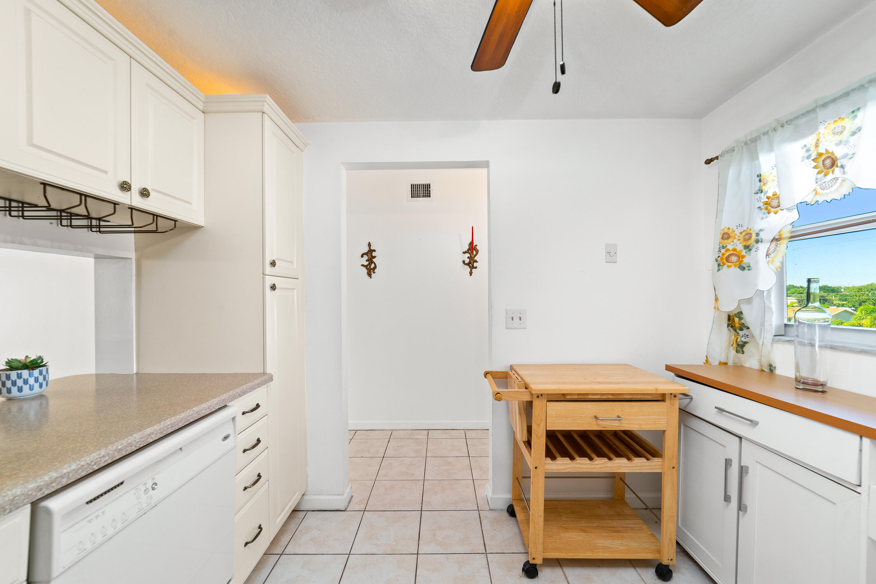 230 Northeast 26th Avenue, Unit 3020 Boynton Beach, FL 33435 - Photo 10 of 44 a utility room with sink dryer and washer