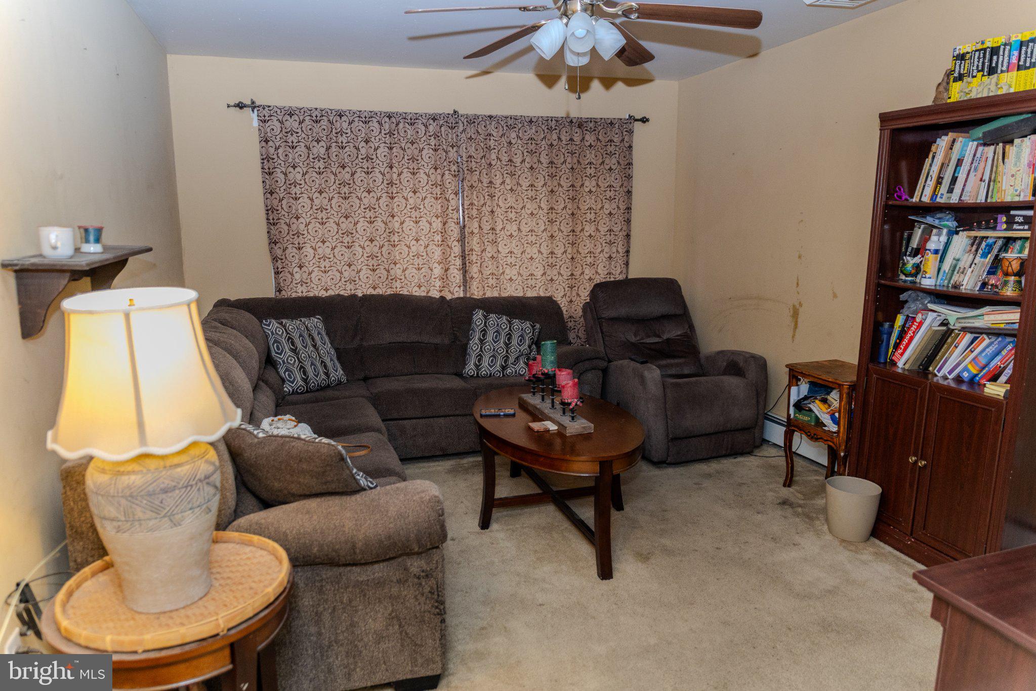 26 Plumtree Road Levittown, PA 19056 - Photo 6 of 16 Cozy living space with warm ambiance.