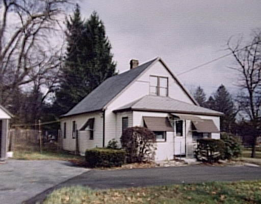 159 Lawrence Road Chicopee, MA 01013 - Photo 1 of 1 a front view of a house with garden
