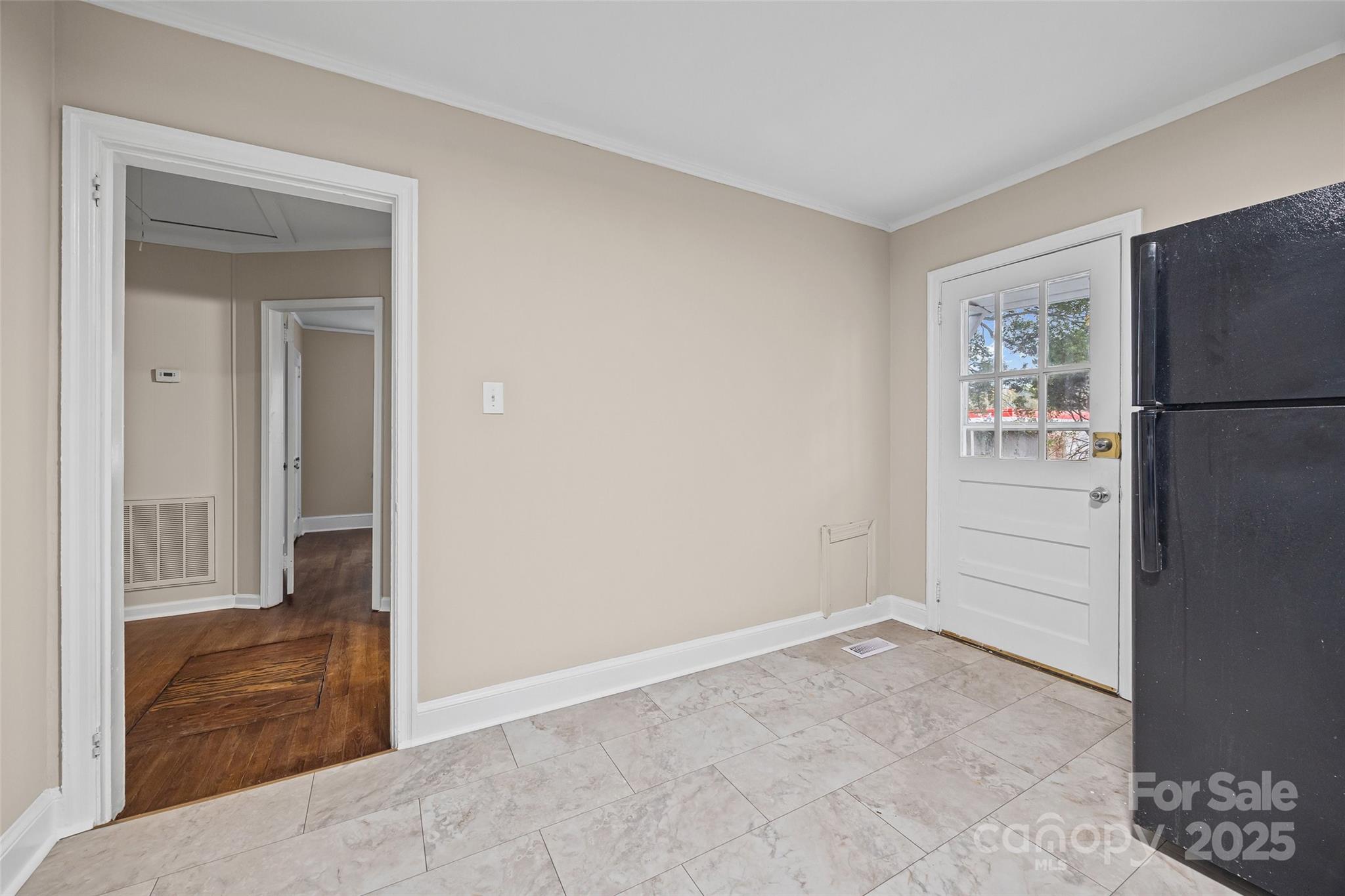1315 Eisenhower Road Rock Hill, SC 29732 - Photo 17 of 21 a view of a kitchen with refrigerator and cabinet