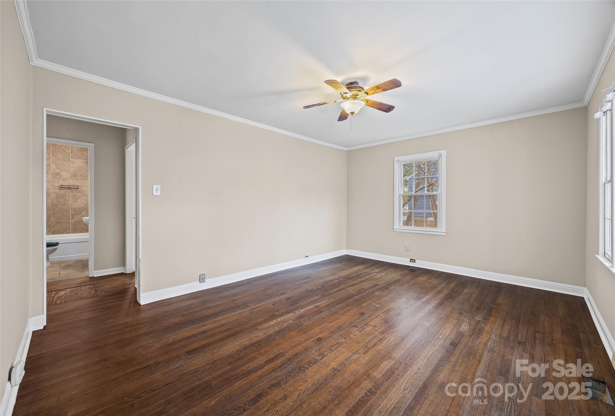 1315 Eisenhower Road Rock Hill, SC 29732 - Photo 5 of 21 a view of an empty room with wooden floor and a window