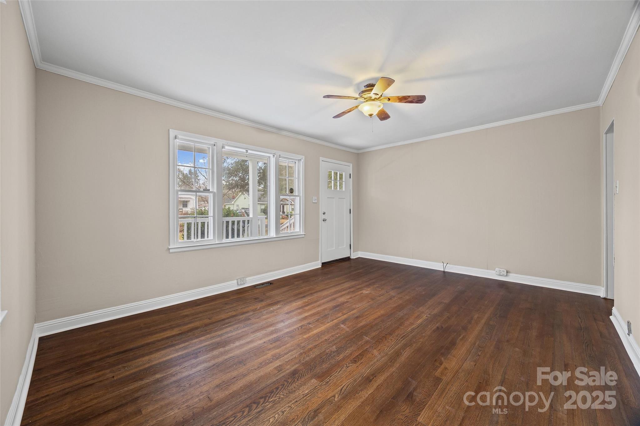1315 Eisenhower Road Rock Hill, SC 29732 - Photo 8 of 21 a view of an empty room with a window and wooden floor