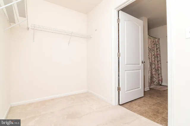 a view of a kitchen with a sink