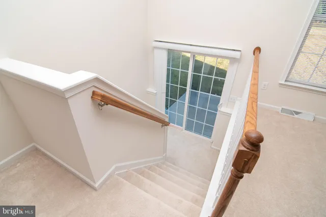 a view of a room with a large window