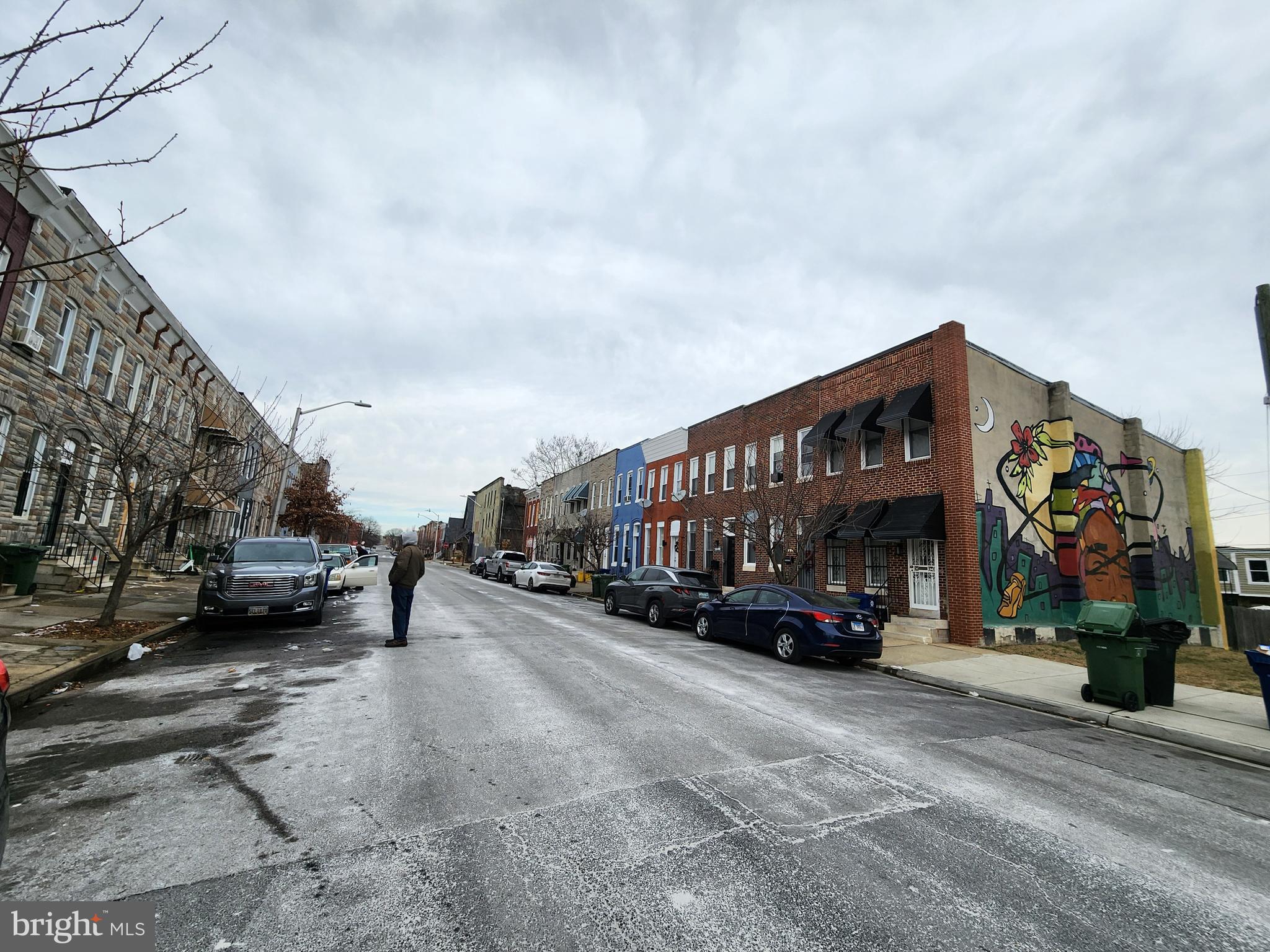 1902 Division Street Baltimore, MD 21217 - Photo 7 of 7 a view of a street with cars
