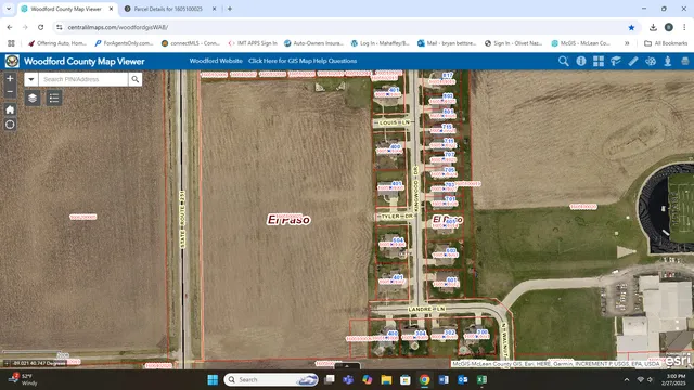 a picture of a bathroom with a shower and a sink