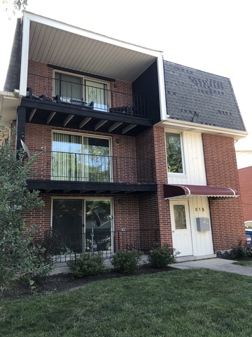 815 South La Grange Road, Unit 3 La Grange, IL 60525 - Photo 1 of 7 a view of a house with a yard