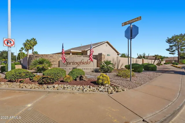 a front view of a building with garden