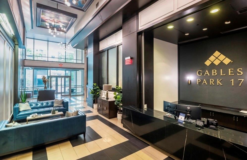 1700 Cedar Springs Road, Unit 2501 Dallas, TX 75201 - Photo 15 of 31 a living room with furniture and a flat screen tv