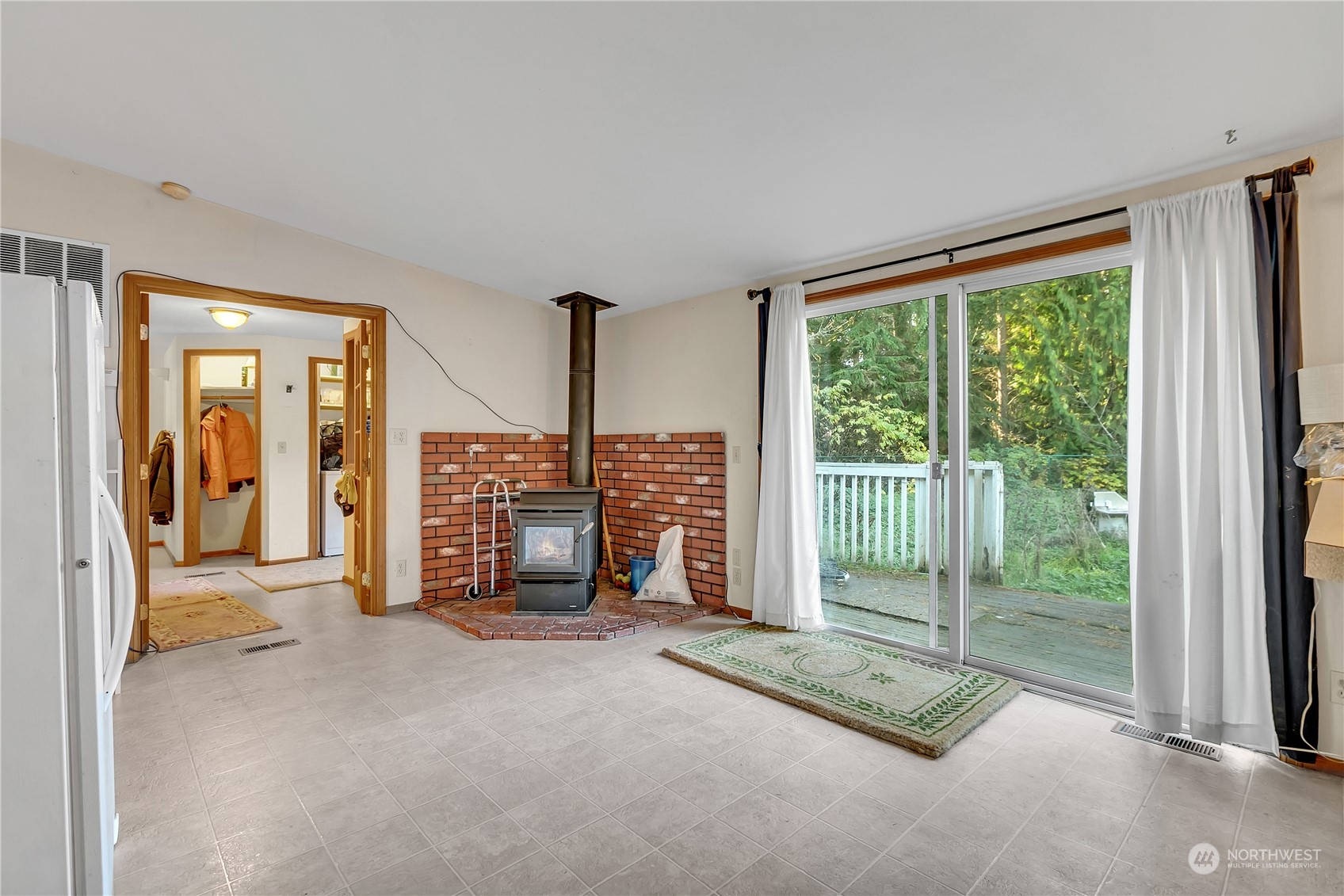 8198 Lusk Road Concrete, WA 98237 - Photo 14 of 36 a view of a room with floor to ceiling windows and a room
