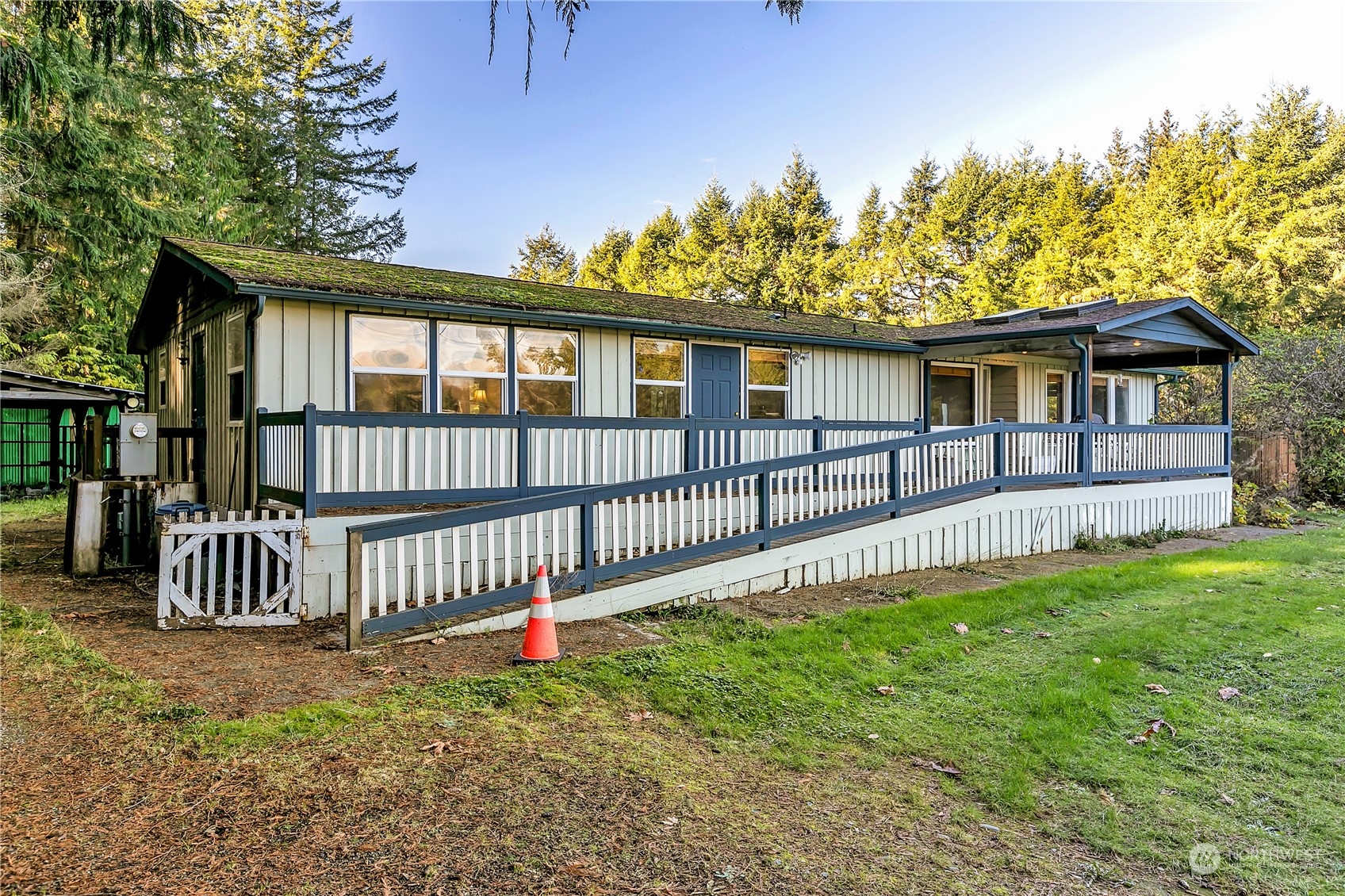 8198 Lusk Road Concrete, WA 98237 - Photo 2 of 36 a view of a house with a yard and deck
