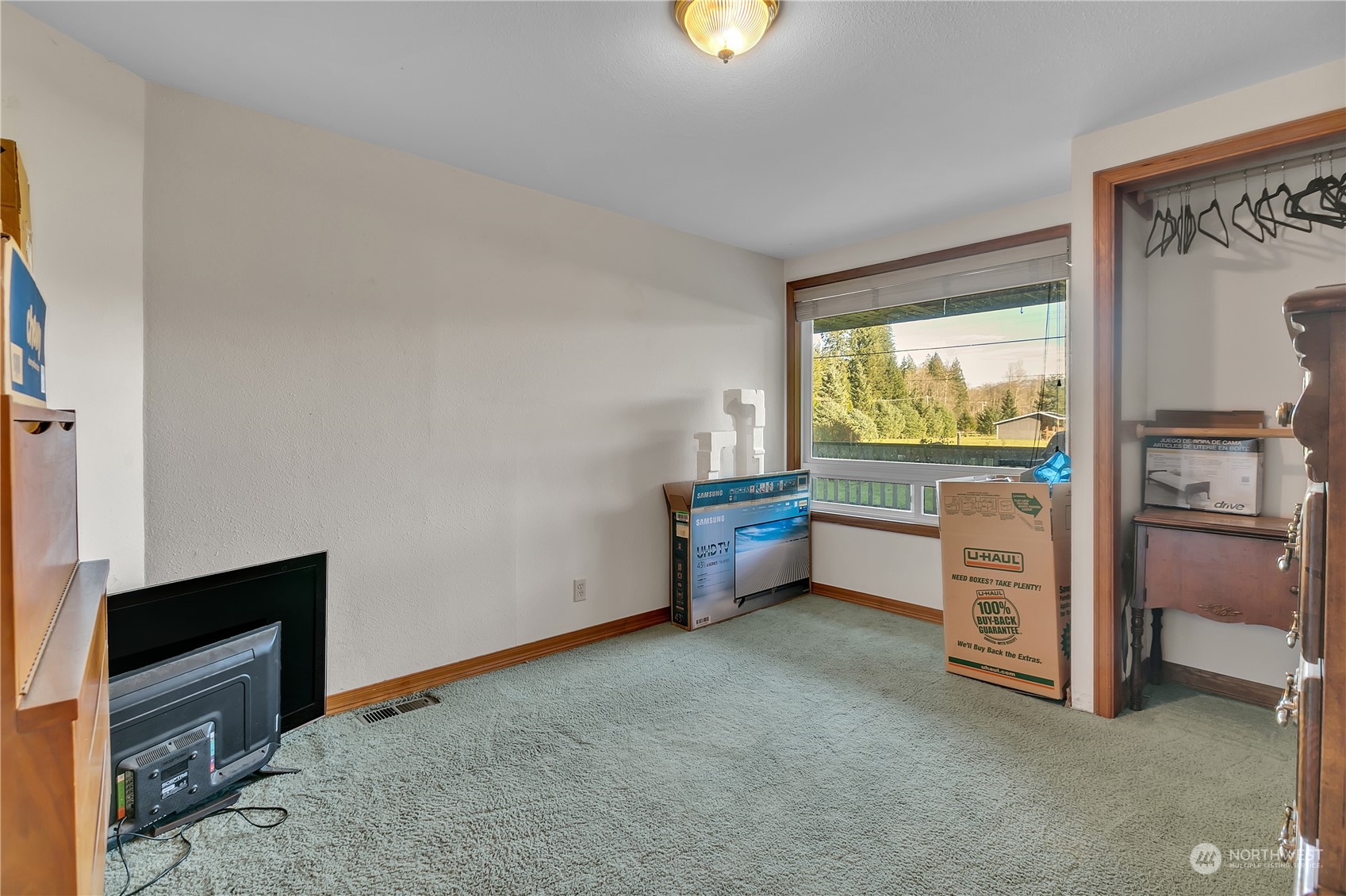 8198 Lusk Road Concrete, WA 98237 - Photo 23 of 36 a view of an empty room and a kitchen