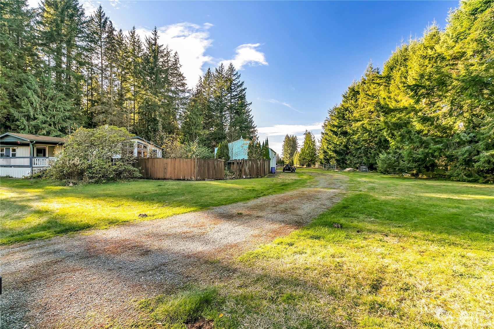 8198 Lusk Road Concrete, WA 98237 - Photo 26 of 36 a view of a house with a yard