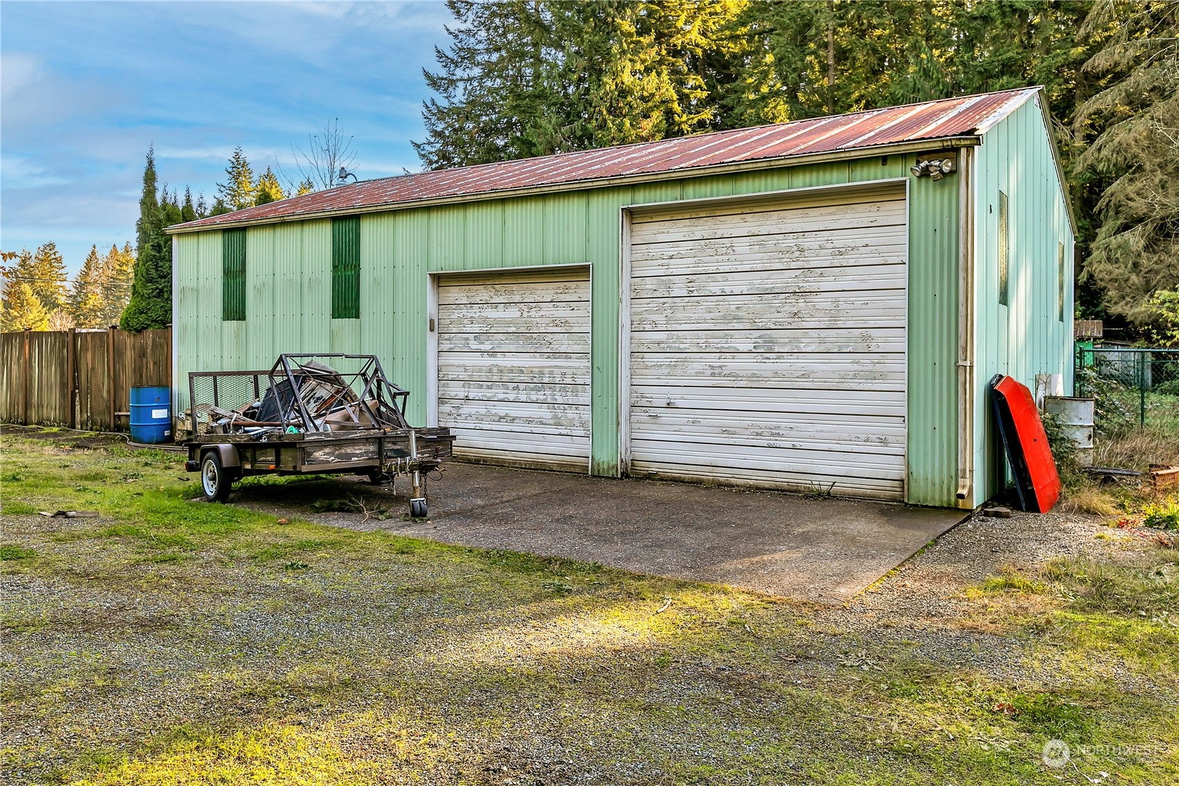 8198 Lusk Road Concrete, WA 98237 - Photo 27 of 36 a view of a house with a yard