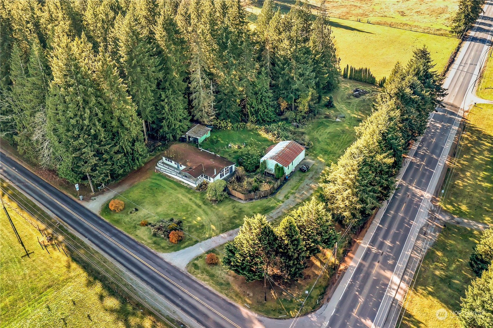 8198 Lusk Road Concrete, WA 98237 - Photo 32 of 36 a view of a yard with wooden fence
