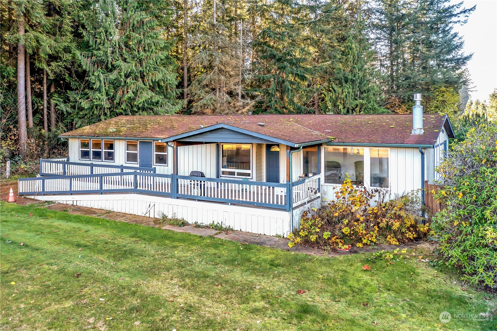 8198 Lusk Road Concrete, WA 98237 - Photo 34 of 36 a house with swimming pool in front of it