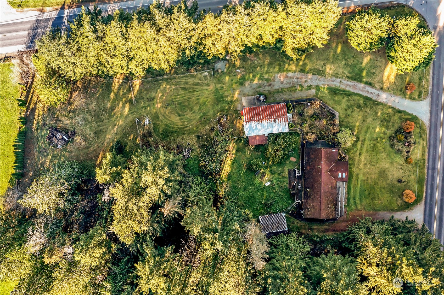 8198 Lusk Road Concrete, WA 98237 - Photo 36 of 36 an aerial view of residential houses with outdoor space