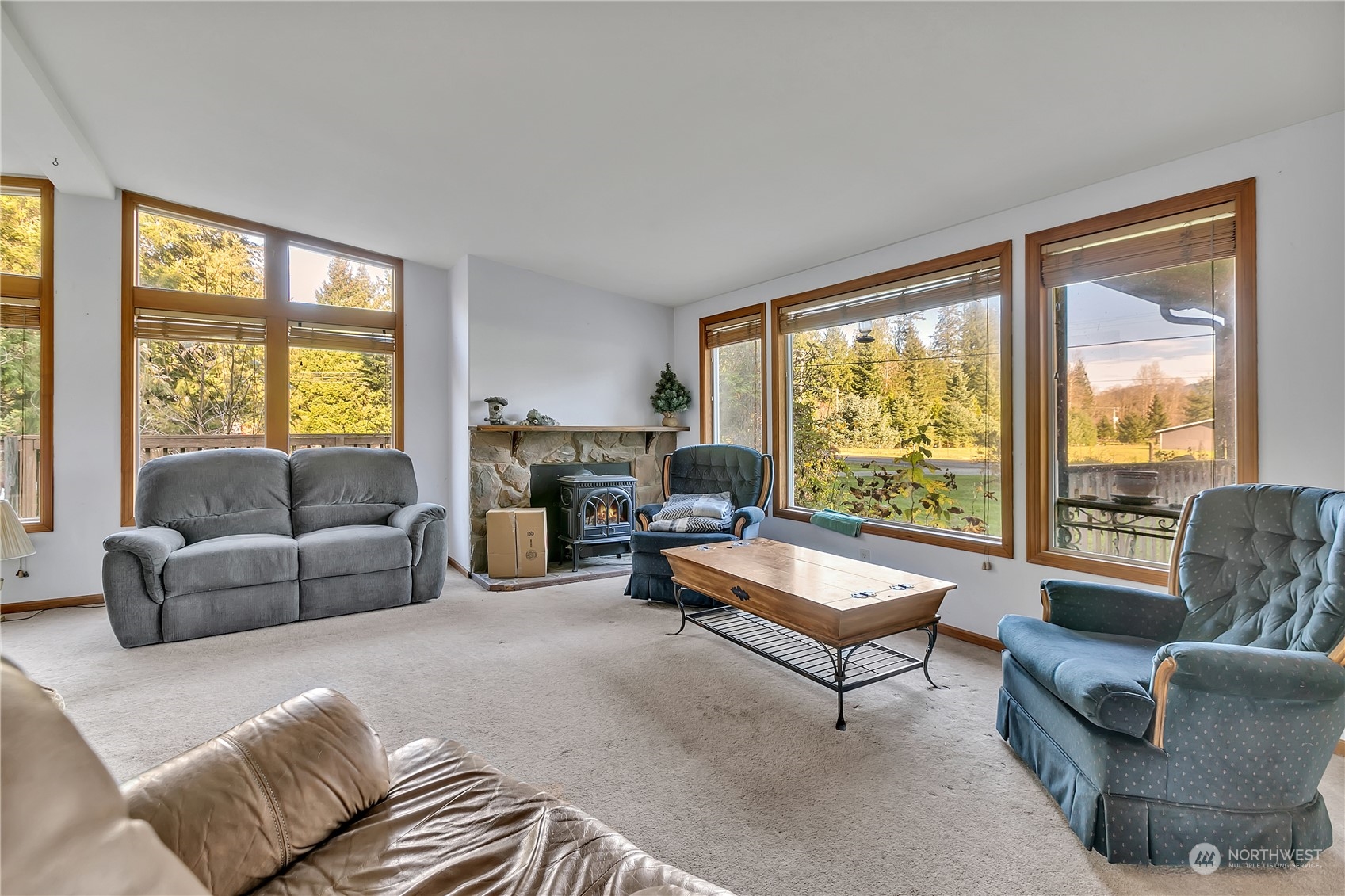 8198 Lusk Road Concrete, WA 98237 - Photo 6 of 36 a living room with furniture and a large window