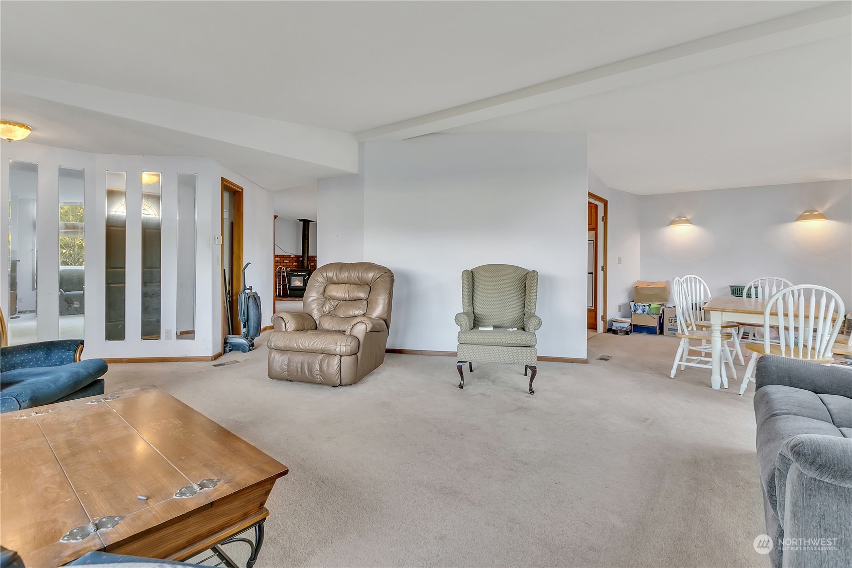 8198 Lusk Road Concrete, WA 98237 - Photo 7 of 36 a living room with furniture and a table