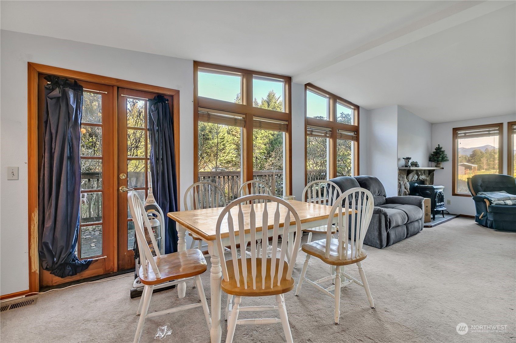8198 Lusk Road Concrete, WA 98237 - Photo 10 of 36 a view of a livingroom with furniture and windows