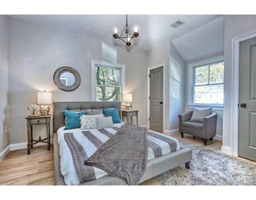 122 Pond Brook Road Newton, MA 02467 - Photo 17 of 24 a living room with furniture and a large window