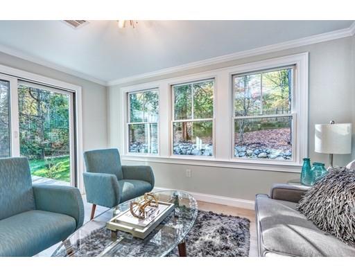 122 Pond Brook Road Newton, MA 02467 - Photo 24 of 24 a living room with furniture and a large window