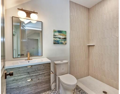 122 Pond Brook Road Newton, MA 02467 - Photo 8 of 24 a bathroom with a sink a toilet and shower