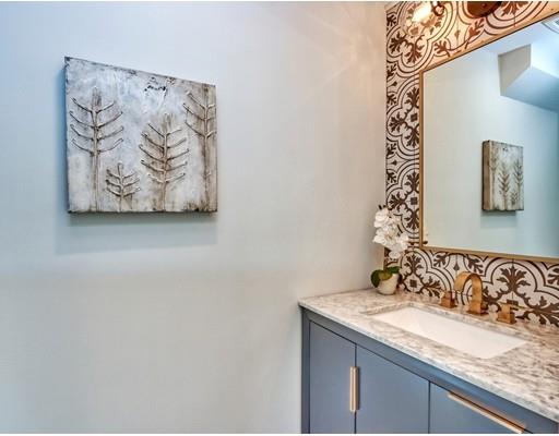 122 Pond Brook Road Newton, MA 02467 - Photo 9 of 24 a bathroom with a granite countertop sink and a mirror