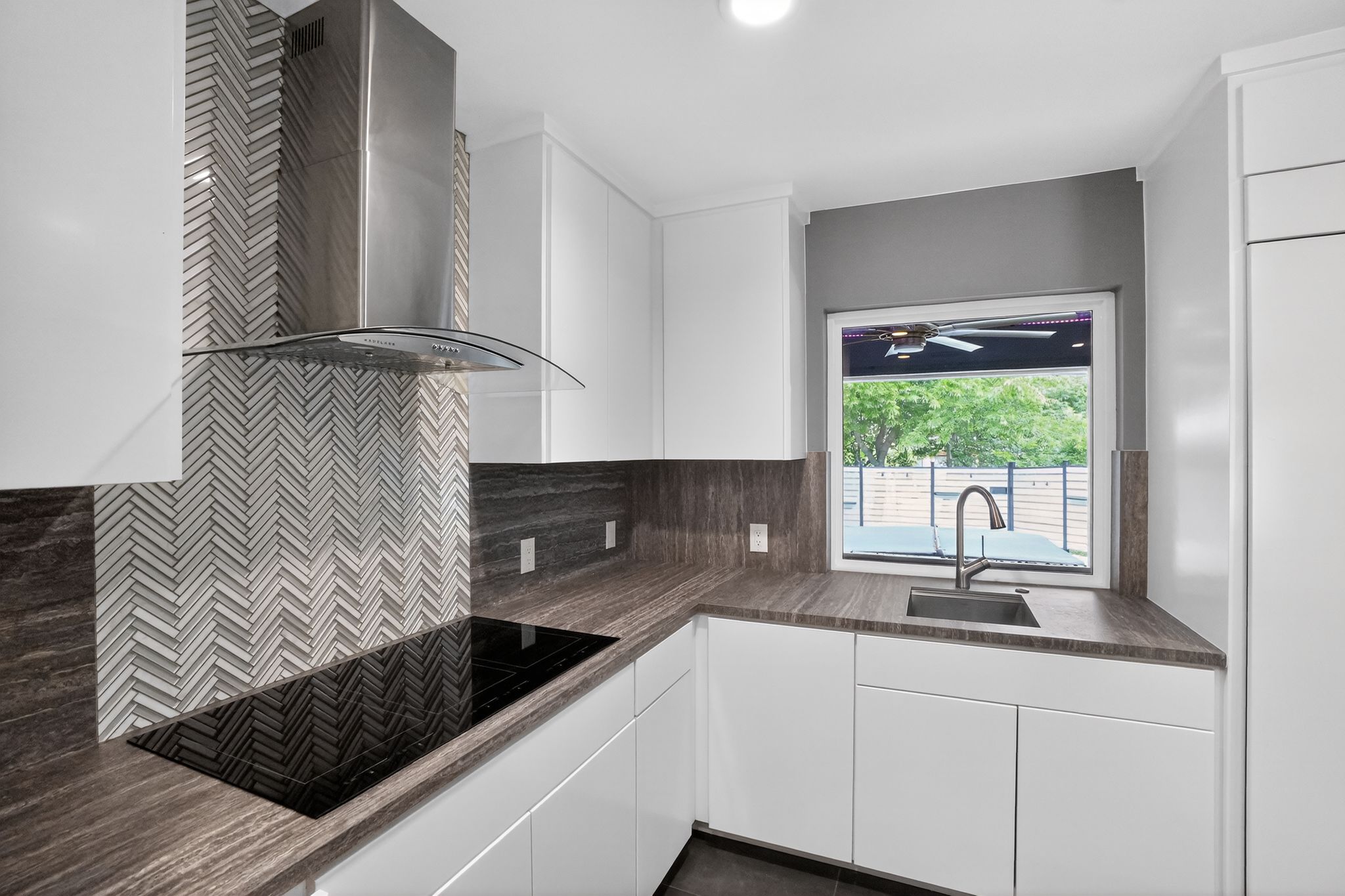 513 Meadowbrook Drive Georgetown, TX 78628 - Photo 11 of 22 a kitchen with a sink and a window