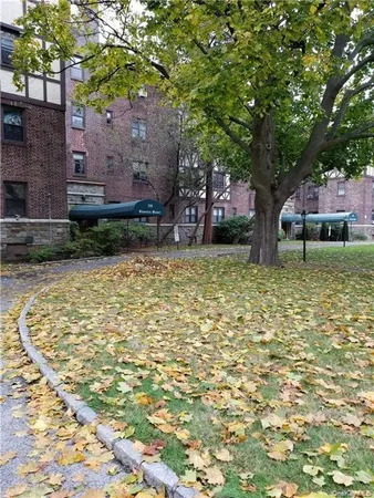 a house with trees in front of it