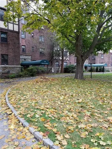 a house with trees in front of it