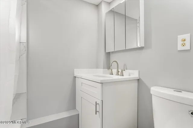 a utility room with sink dryer and washer