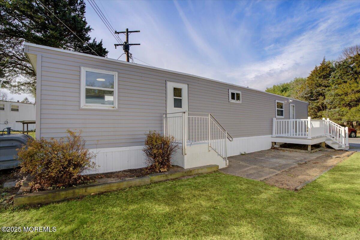 114 Cookstown New Egypt Road, Unit C7 Wrightstown, NJ 08562 - Photo 2 of 30 a view of a house with a yard