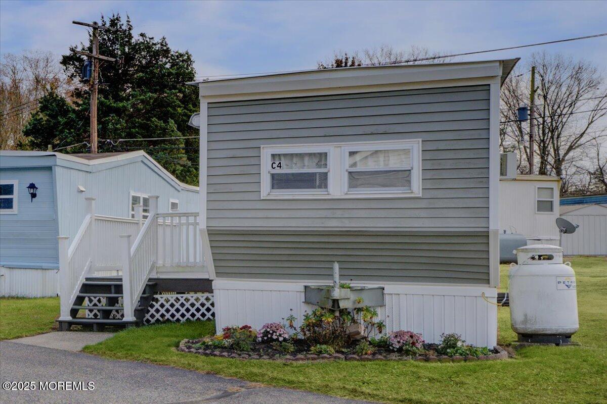 114 Cookstown New Egypt Road, Unit C7 Wrightstown, NJ 08562 - Photo 6 of 30 a front view of a house with a yard